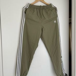 Adidas green track pants